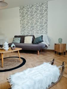 Posezení v ubytování Les Marmottons appartement cosy