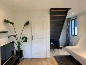 Un lugar para sentarse en Appartement duplex proche zénith, mégacité, stade