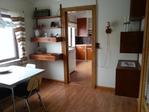 A kitchen or kitchenette at Guesthouse Hugo