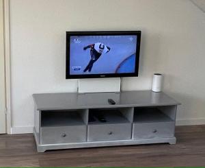 A television and/or entertainment centre at TopSleep Apartments 26-3