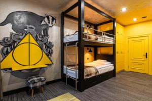 A bed or beds in a room at Emily Magic Hostel