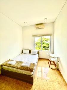 Voodi või voodid majutusasutuse Best Canggu Hostel toas