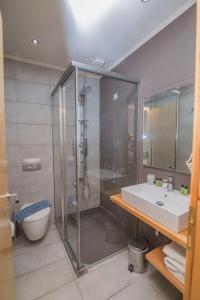 Grand TheoNi Boutique Hotel & Spa tesisinde bir banyo