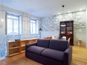 Гостиная зона в Apartamentos Premium Familiares - Loft Guesthouse BeMyGuest Viseu