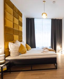 Rúm í herbergi á Pure Berlin Apartments - Luxury at Pure Living in City Center