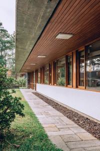 an external view of a building with windows at Parque do Rio Ofir Hotel in Esposende