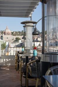 Casa 1810 Hotel Boutique tesisinde bir balkon veya teras