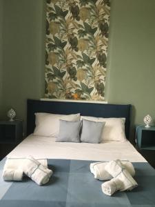 A bed or beds in a room at La Finestra Sul Mare