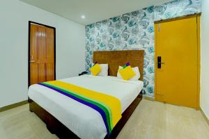 Katil atau katil-katil dalam bilik di Itsy Hotels Buddha Inn