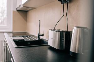 A kitchen or kitchenette at Tulip Guest House II.