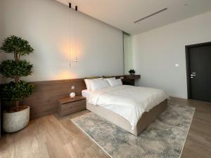 Tempat tidur dalam kamar di Villa 72 RAK