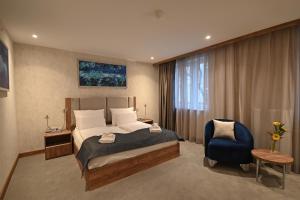 Giường trong phòng chung tại Hotel Foldana