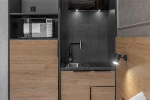 Una cocina o kitchenette en Jam Apartments Lviv