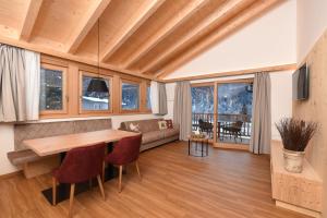 Posedenie v ubytovaní Les Ciases Chalets Dolomites