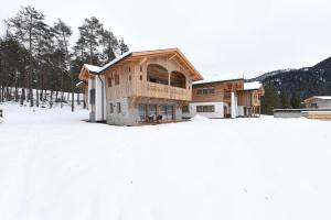 Les Ciases Chalets Dolomites pozimi