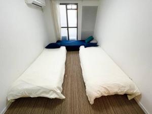 Krevet ili kreveti u jedinici u objektu SIMPLY WHiTE GUEST ROOM302