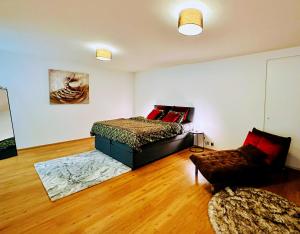 Cama ou camas em um quarto em Montreux lake side apartment!