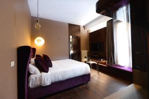 Lova arba lovos apgyvendinimo įstaigoje The Babuino - Luxury serviced apartment