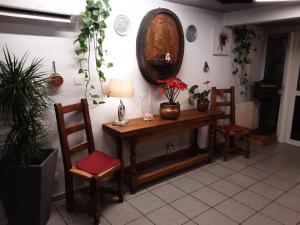 Гостиная зона в Hôtel Acacia Nancy sud Lunéville