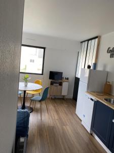 Ett kök eller pentry på Super appartement cosy, parking privé