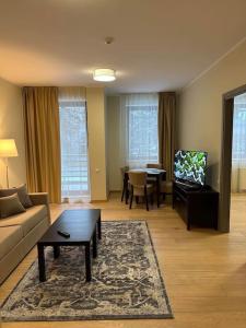 Lodge Euphoria Apartment tesisinde bir oturma alanı