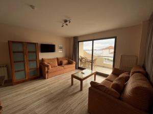 A seating area at Apartamentos Astuy