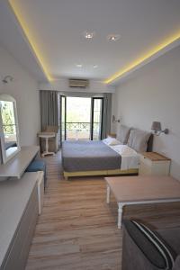 Foto de la galeria de Callisto Beach Hotel a Liapades