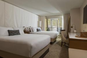 Tempat tidur dalam kamar di Newport Marriott Hotel & Spa