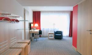 Cama ou camas em um quarto em Park Inn by Radisson Linz