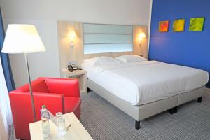 Cama ou camas em um quarto em Park Inn by Radisson Linz