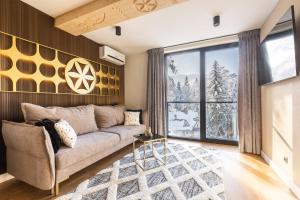 Et opholdsområde på Tatry Residence SPA - 1,1 km stacja narciarska Szymoszkowa