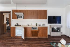 Кухня или кухненски бокс в Apartamenty Eko