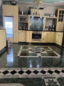 A kitchen or kitchenette at Villa in Walsrode