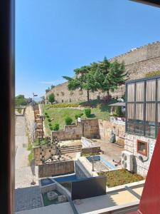 a view from a window of a building at Hotel Castrum in Skopje