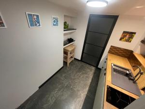 Kuhinja oz. manjša kuhinja v nastanitvi Cichy Apartament Gdańsk