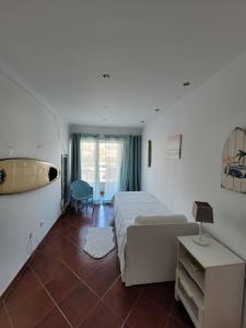 Cama ou camas em um quarto em Beach and Surf House