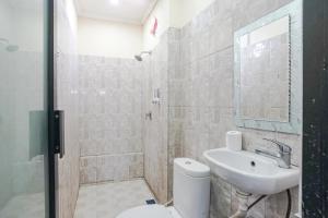 Ванная комната в Taxa Uma Guest House