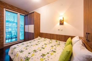 Voodi või voodid majutusasutuse Ohrid Boutique Apartments toas