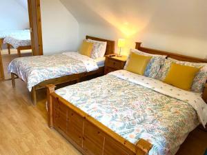 Кровать или кровати в номере Slieve League House B&B