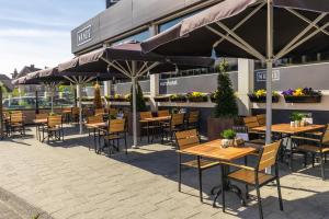 Um restaurante ou outro lugar para comer em Eurohotel