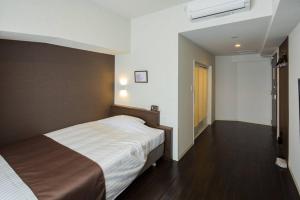 Katil atau katil-katil dalam bilik di Hotel Grand View Fukuoka-Kuko