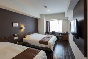 Katil atau katil-katil dalam bilik di Hotel Grand View Fukuoka-Kuko