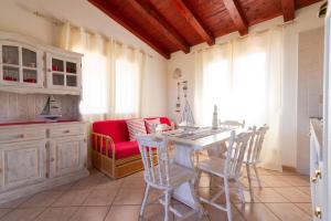 A kitchen or kitchenette at Residence SardegnaSummer Li Cuppulati