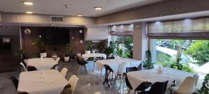 A restaurant or other place to eat at Poseidonio