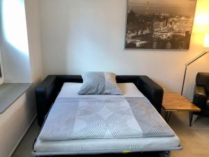 Cama ou camas em um quarto em Erdgeschoss-Appartement mit Seeterasse