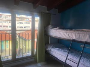 Krevet ili kreveti u jedinici u okviru objekta MRHostel Milano