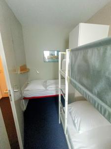 A bed or beds in a room at Amelander Kaap 39