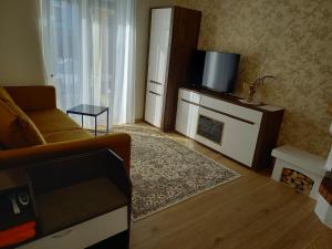 Телевізор і / або розважальний центр в Pärnu Posti Apartment