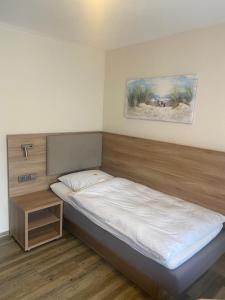 Hotel am Stern Uelzen में एक कमरे में एक या कई बेड