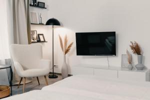 Televisyen dan/atau pusat hiburan di Soulplace Studioapartment Gelsenkirchen